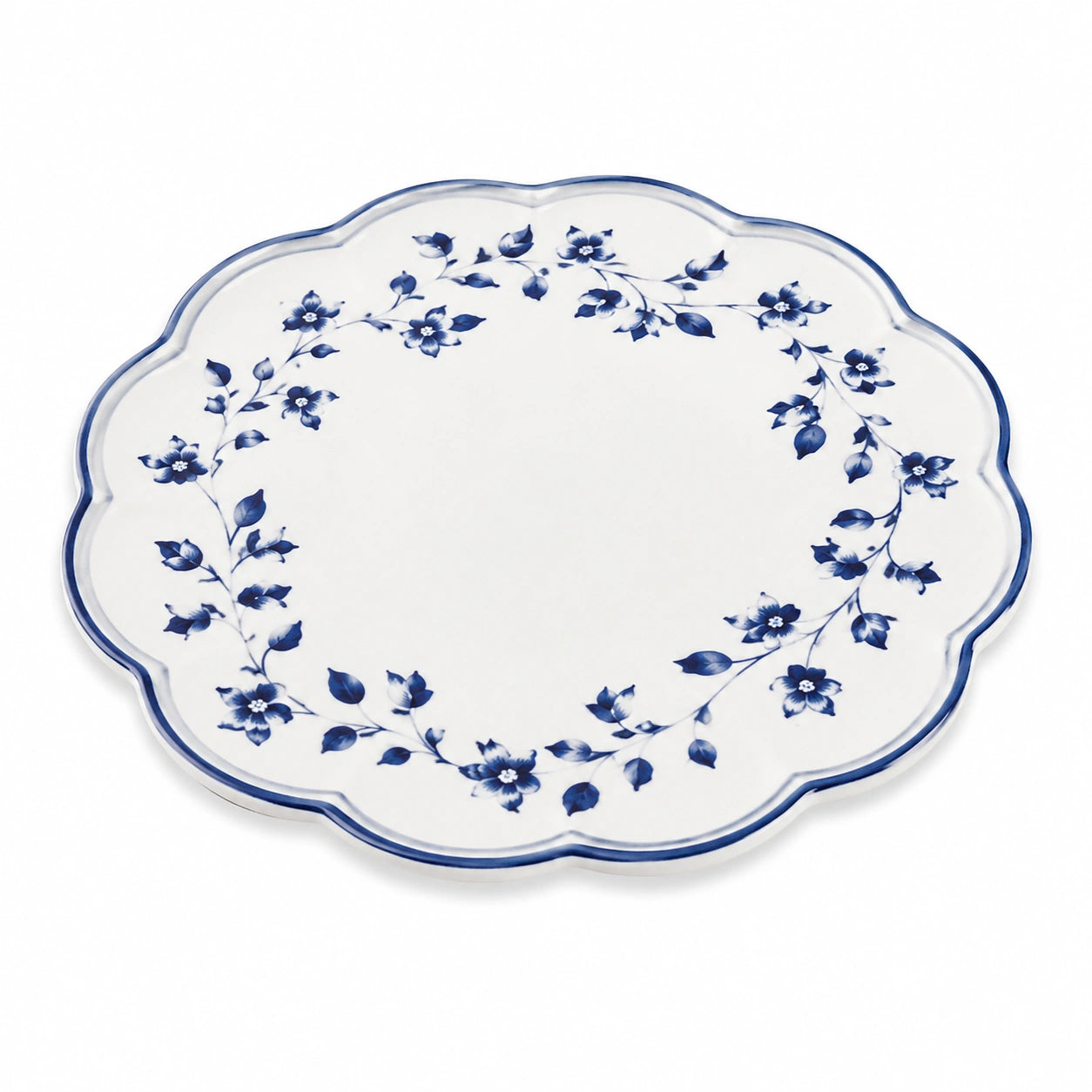 Plat de service rond 30 cm en porcelaine blanche et bleue à motif floral festonné